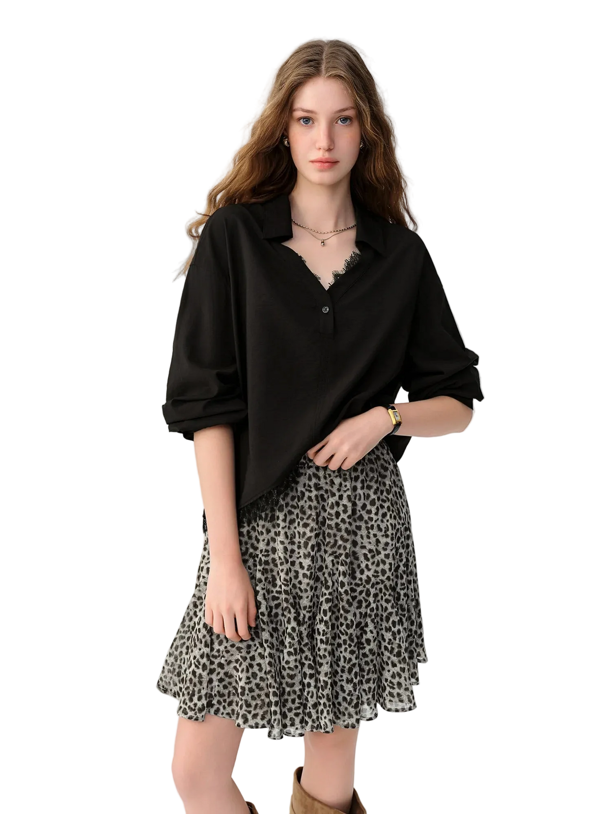 A model wearing a black button-up shirt and a black-and-white leopard print skirt, standing against a plain white studio background. The brand name 'Dushu' is visible in the top left corner.