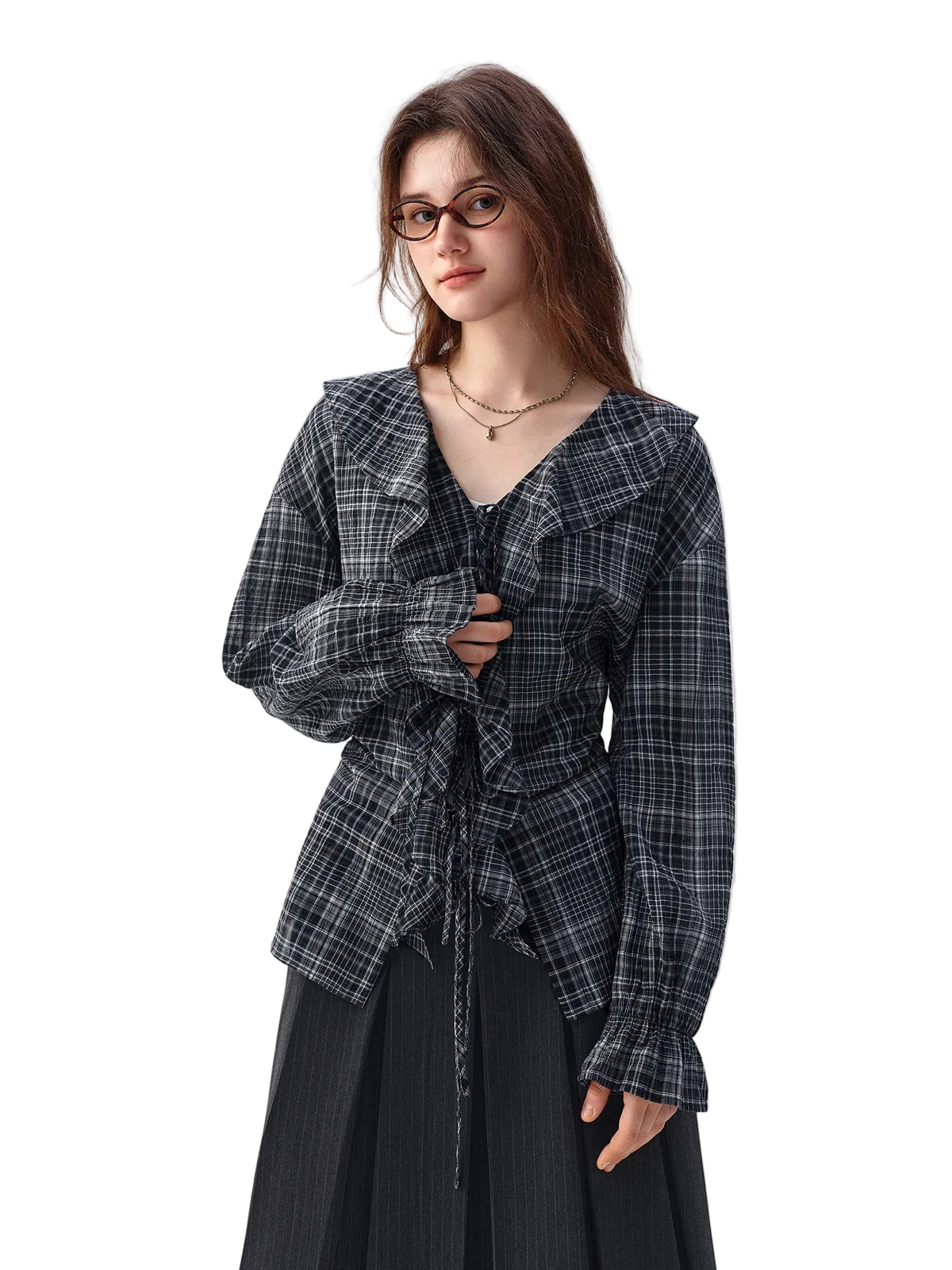 A woman modeling a Dushu long-sleeve plaid wrap top with a ruffled V-neckline and tie detail, paired with a dark skirt, against a plain white studio background.